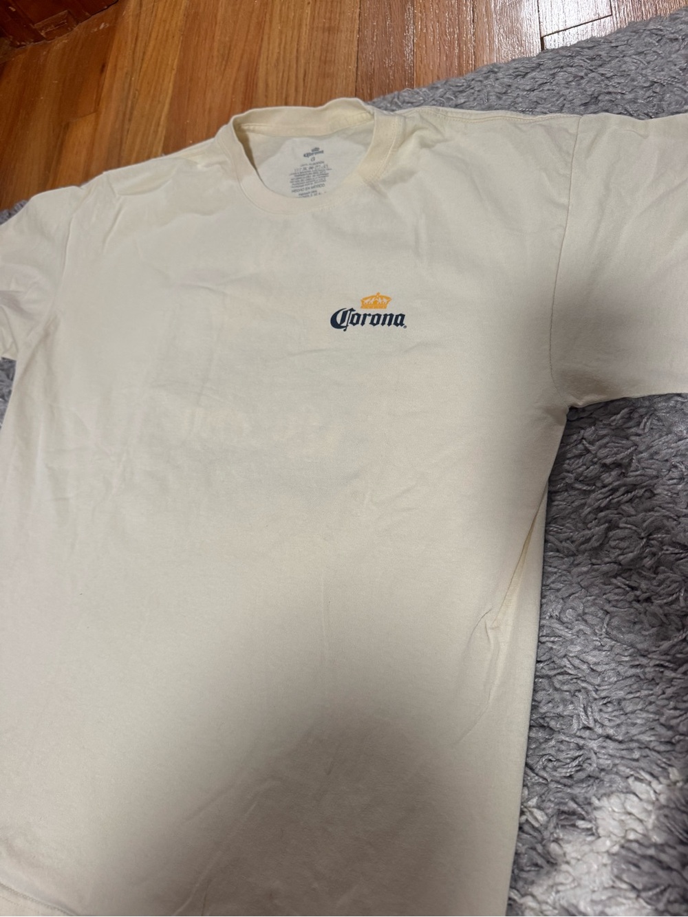 Corona Men’s Cream Short Sleeve Tee with Navy Logo